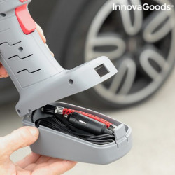 Detalle del compartimento oculto en la base del compresor para guardar el cable de 3,5 metros y accesorios